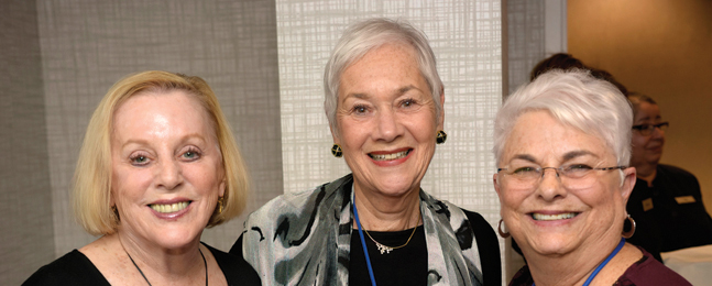 Three smiling women